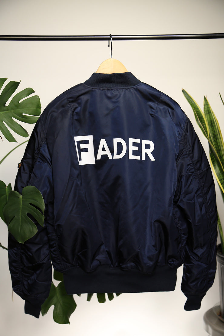 back of FADER x Alpha MA navy flight jacket with FADER logo